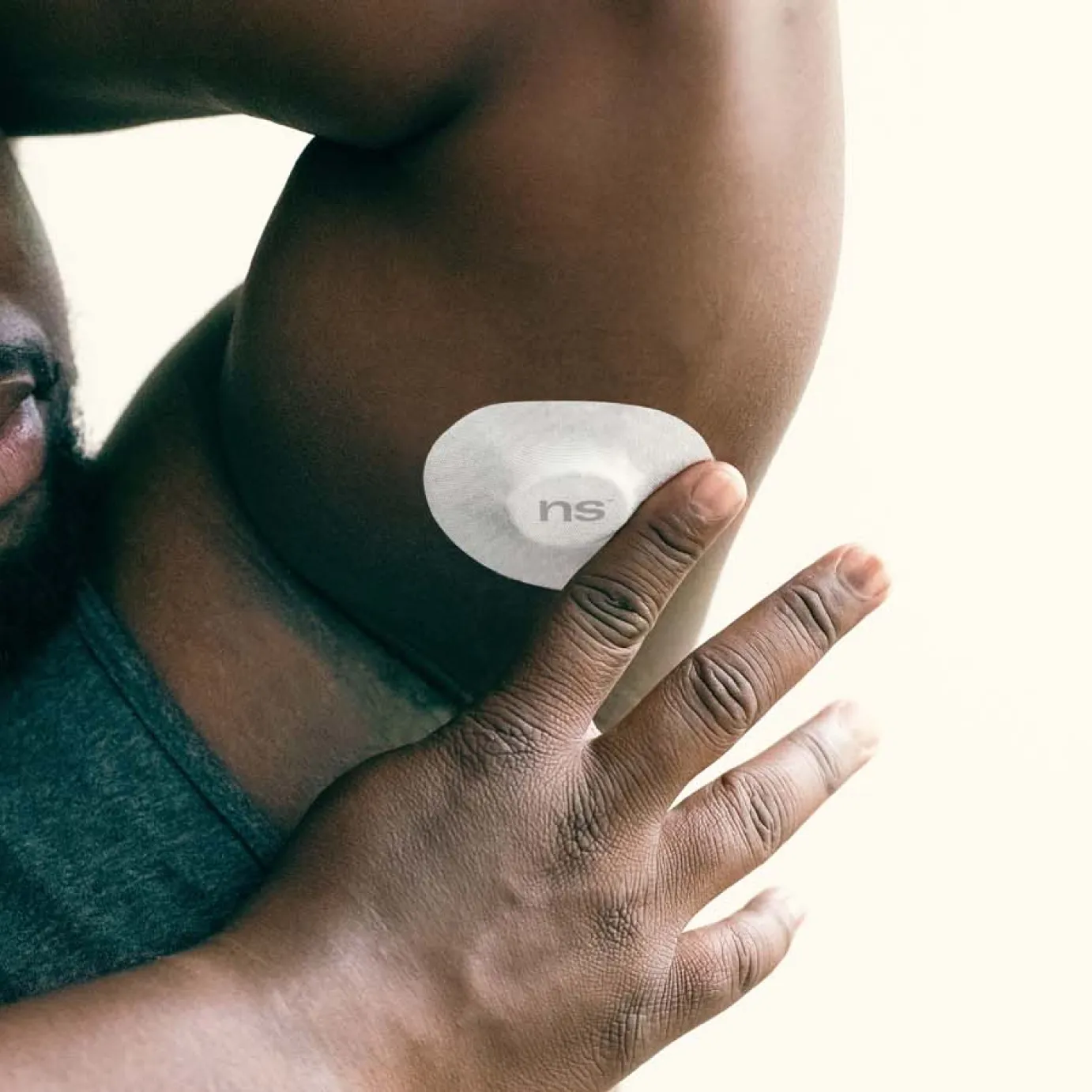 A man kept Nutrisense patch on top of CGM sensor found in his left upper hand.