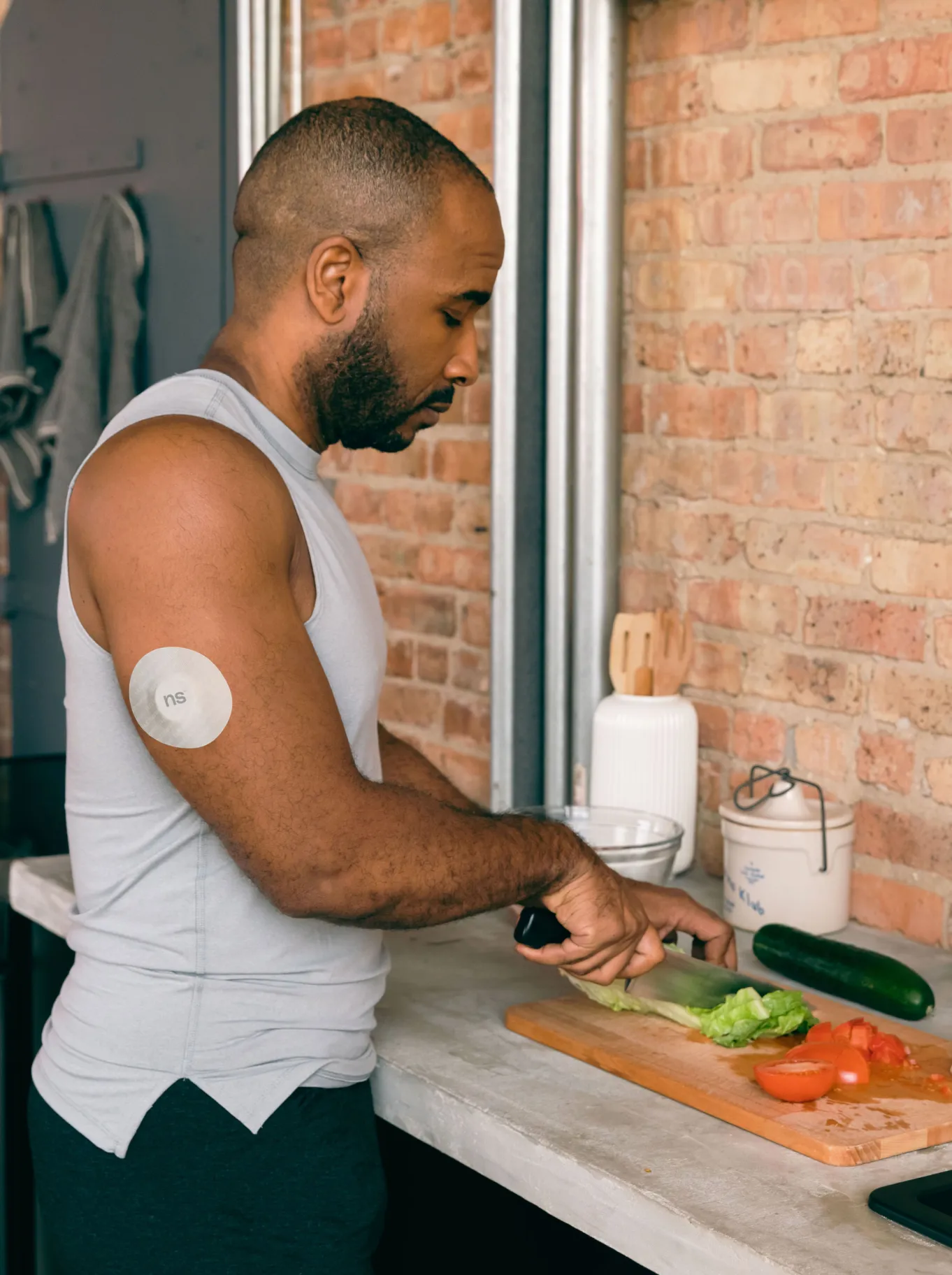 Nutrisense member cutting vegetables