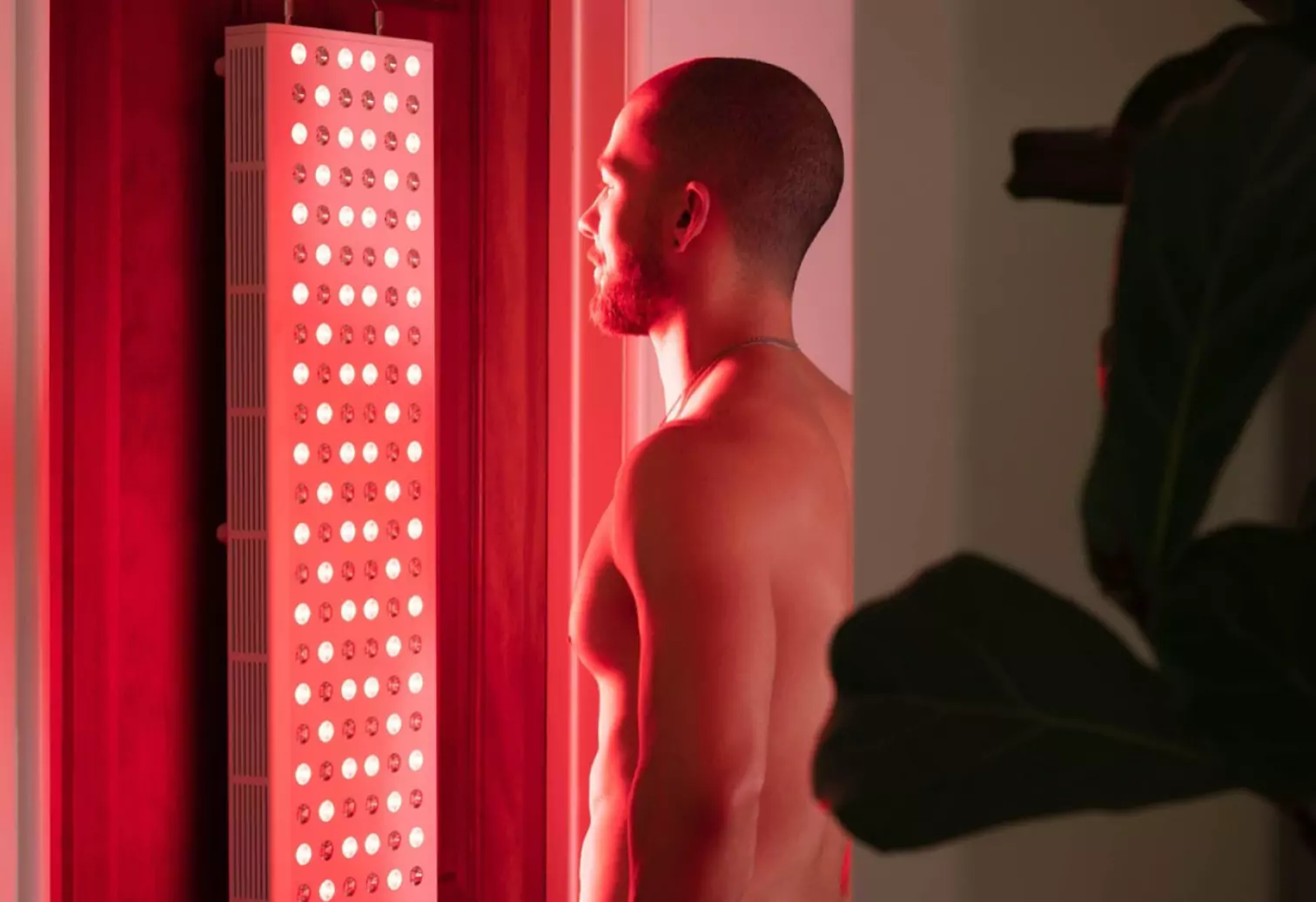 Man getting full body red light therapy