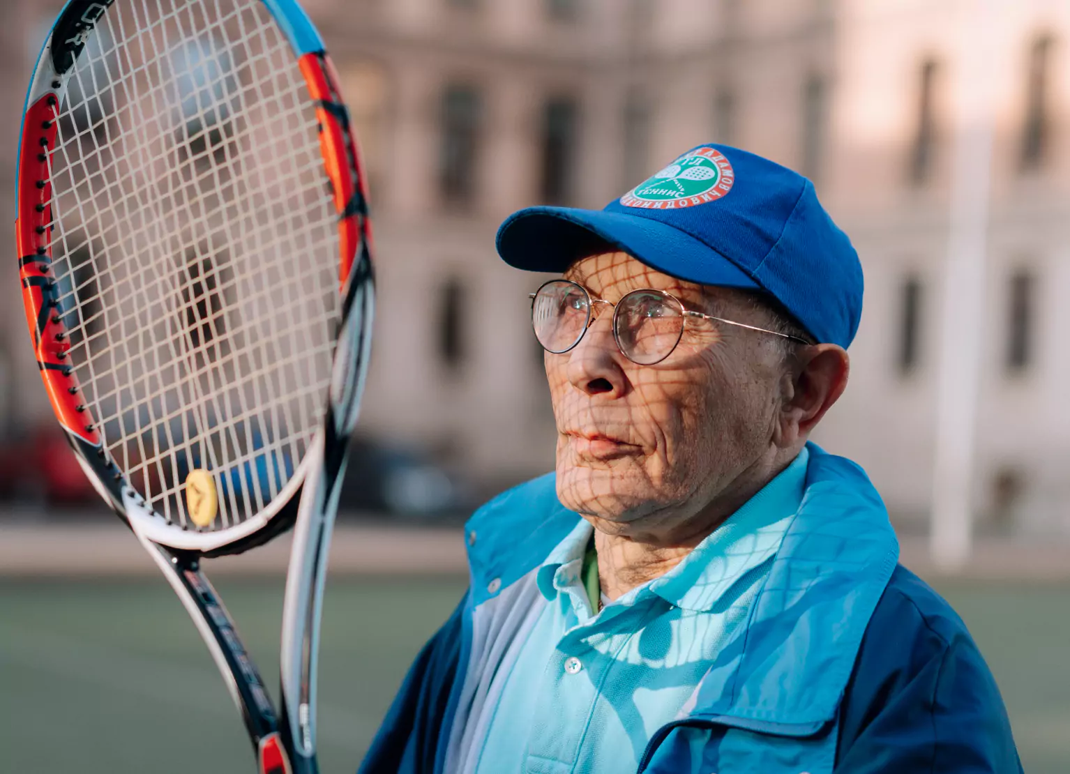 someone holding a tennis racket