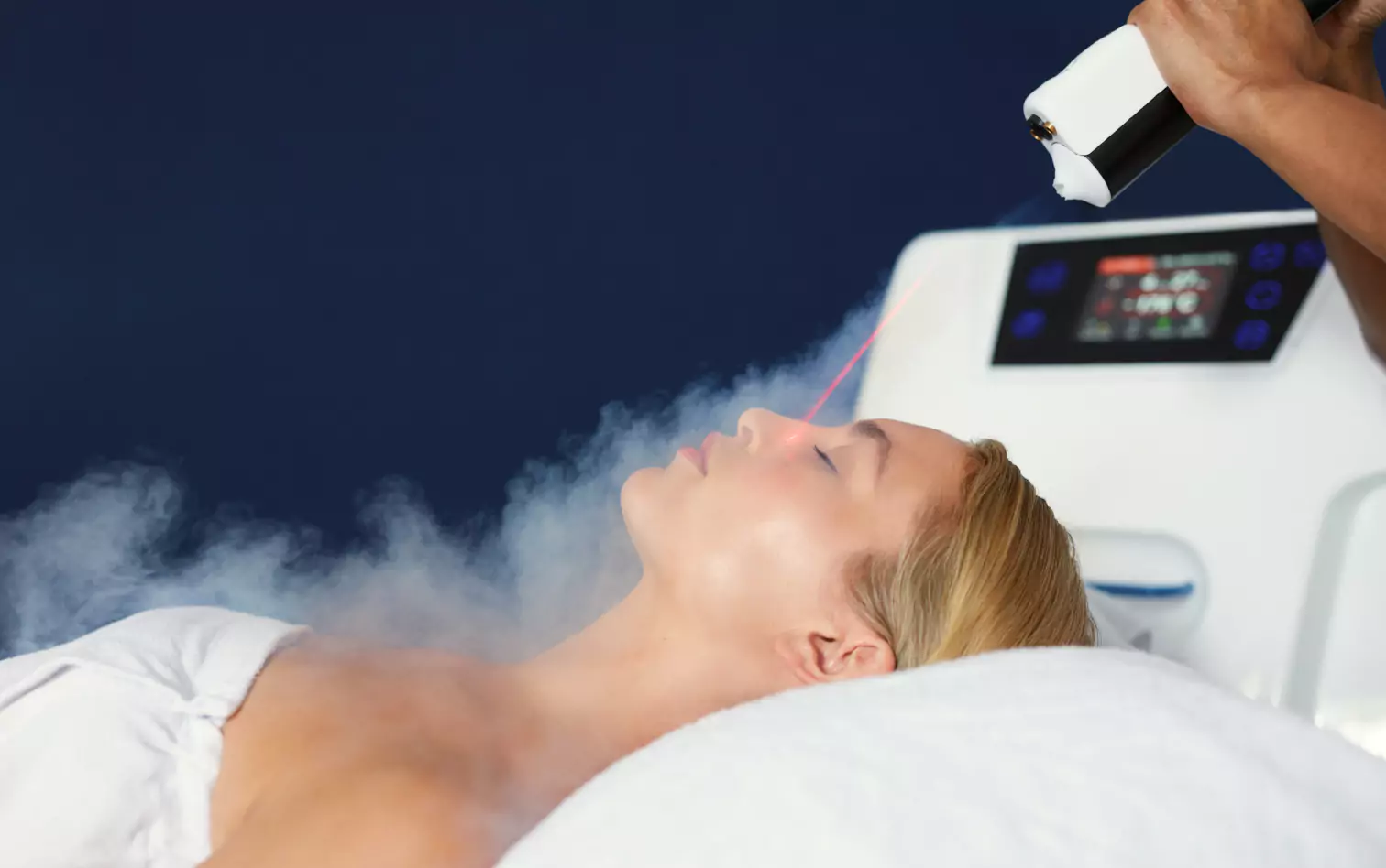 a woman getting cryotherapy facial treatment