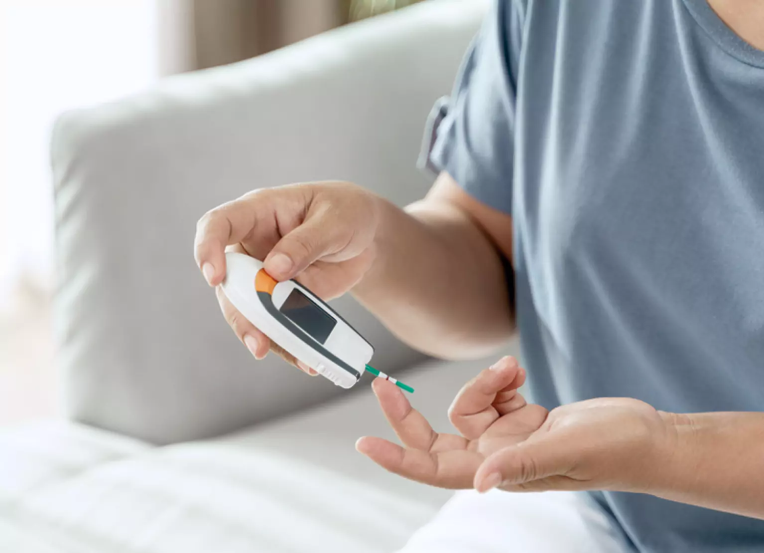 a person checking their blood sugar