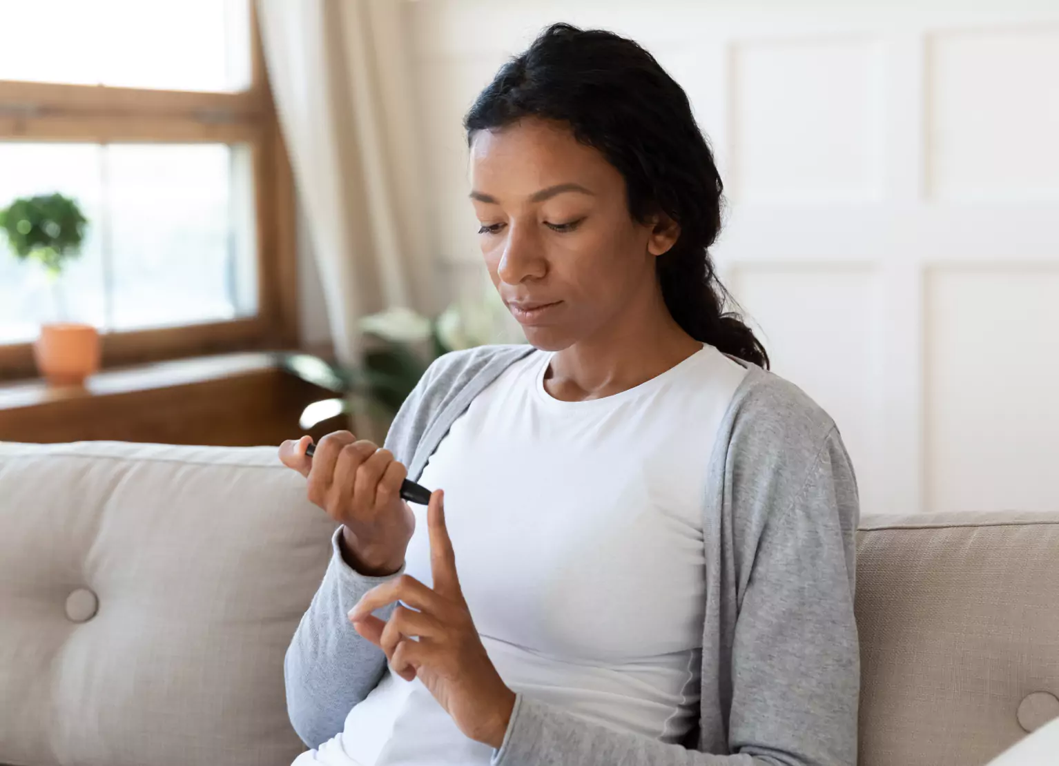 a person checking their blood sugar