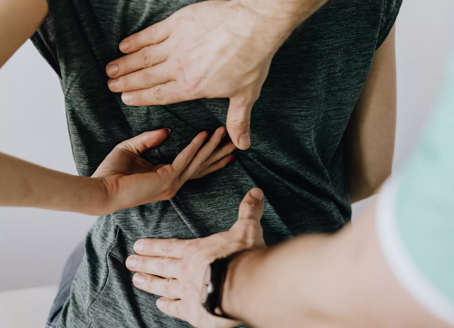 a person stretching their back