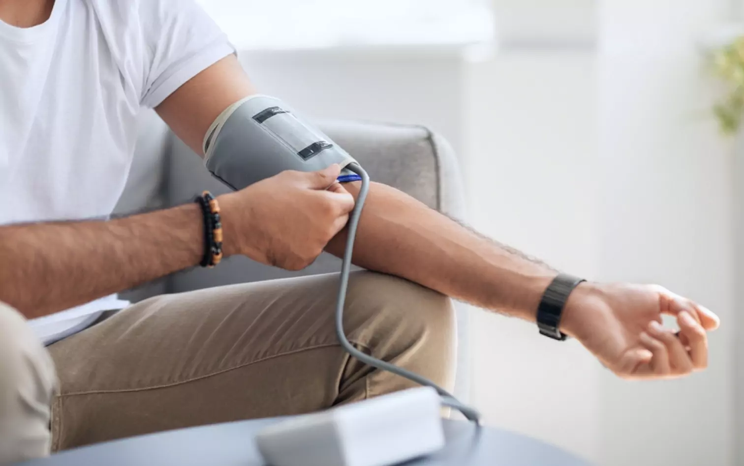 a person checking their blood pressure