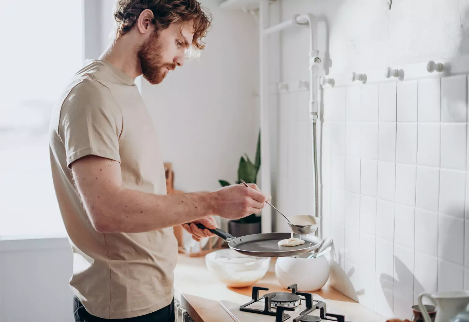 someone making pancakes 