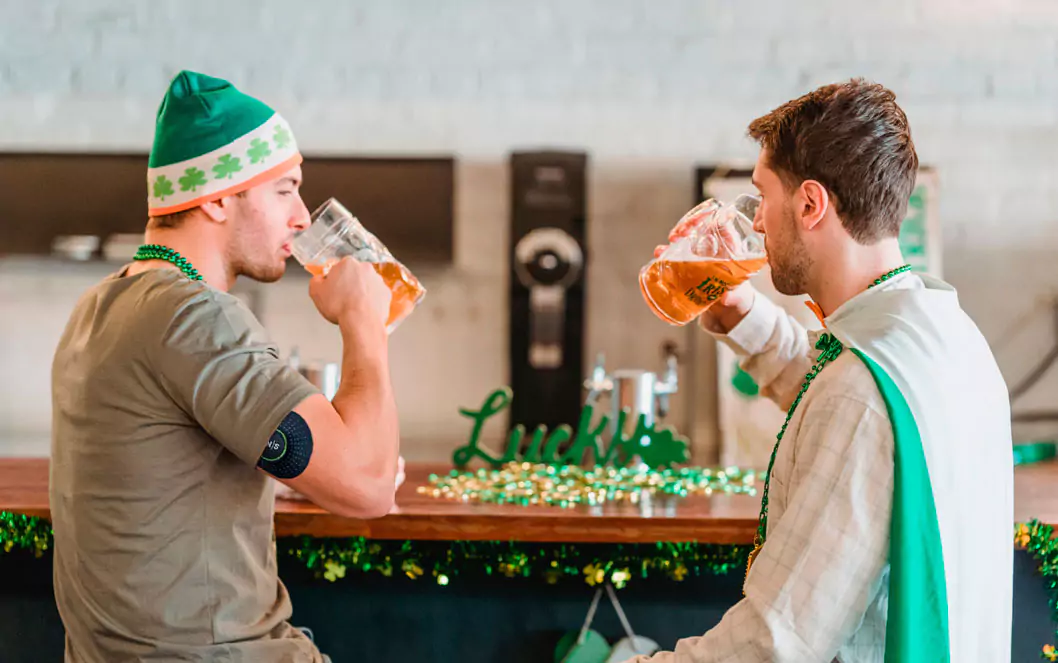 two people drinking beer