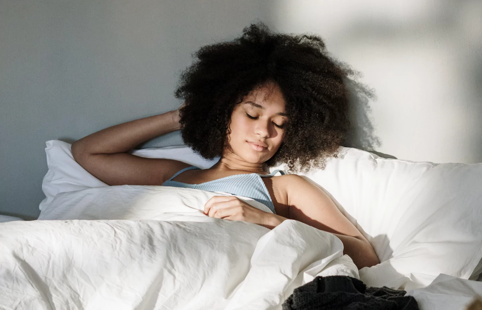 a person sleeping in a bed