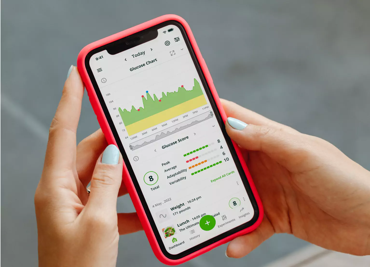 a person checking glucose chart in Nutrisense app