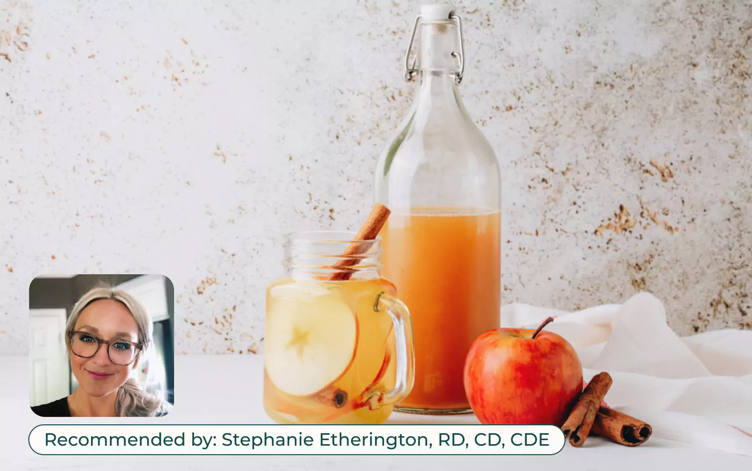 a bottle and a cup of ACV drink recommended by Stephanie Etherington