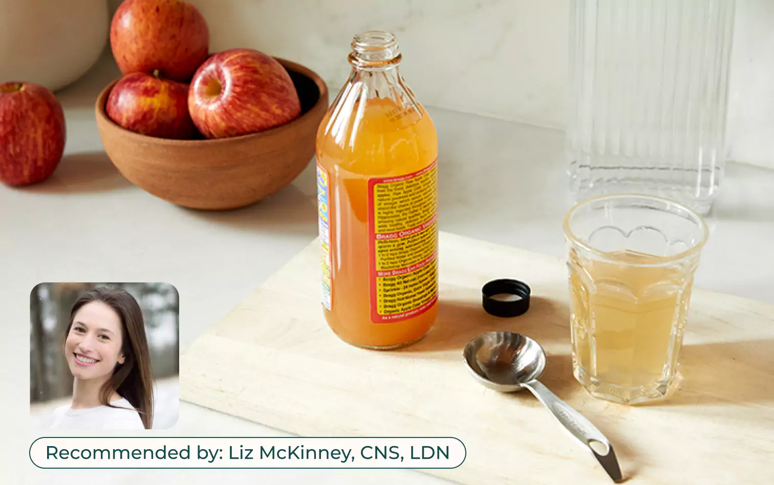 a bottle and a glass of ACV drink recommended by Liz McKinney