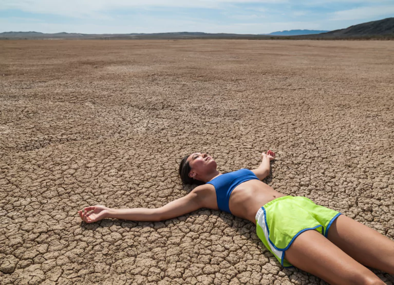 woman laying down outside