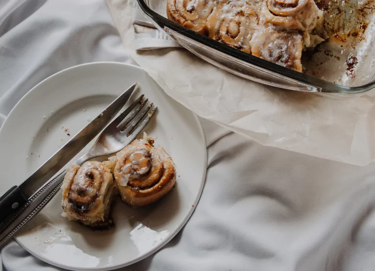 a plate of cinnamon rolls