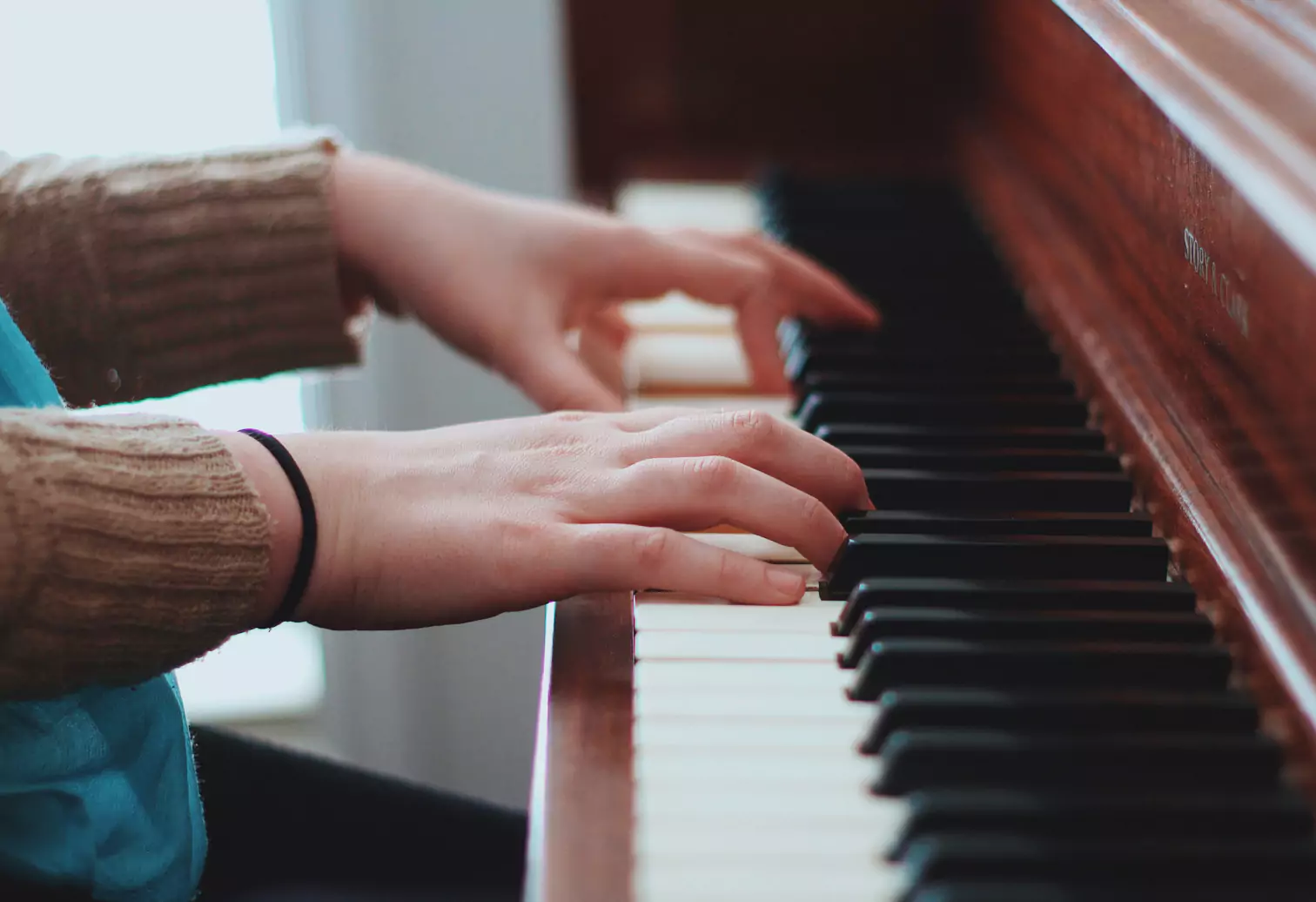 someone playing piano