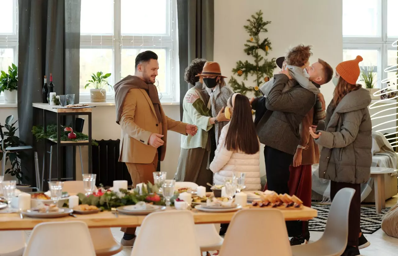 a group of people greeting each other 