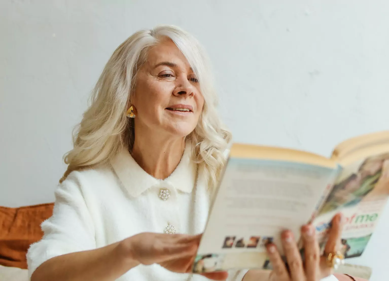 an older person reading a book