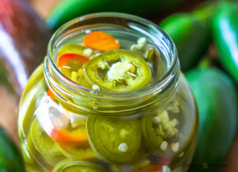 a jar of canned jalapeños