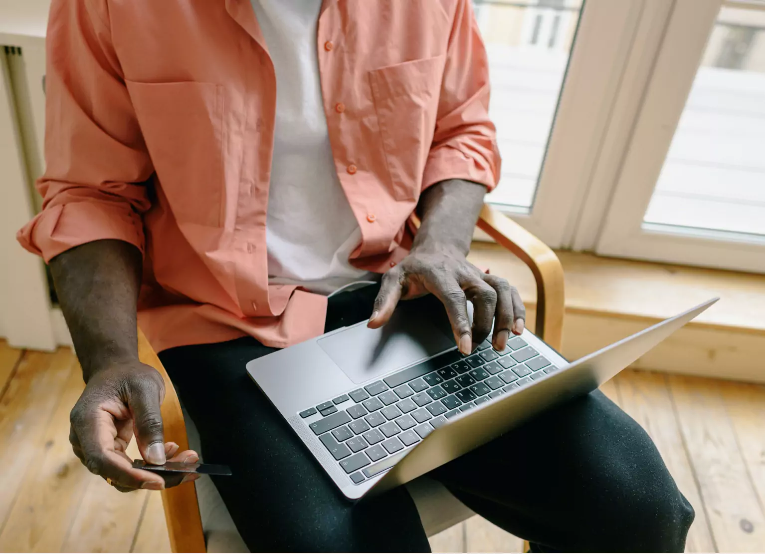 Person typing on laptop