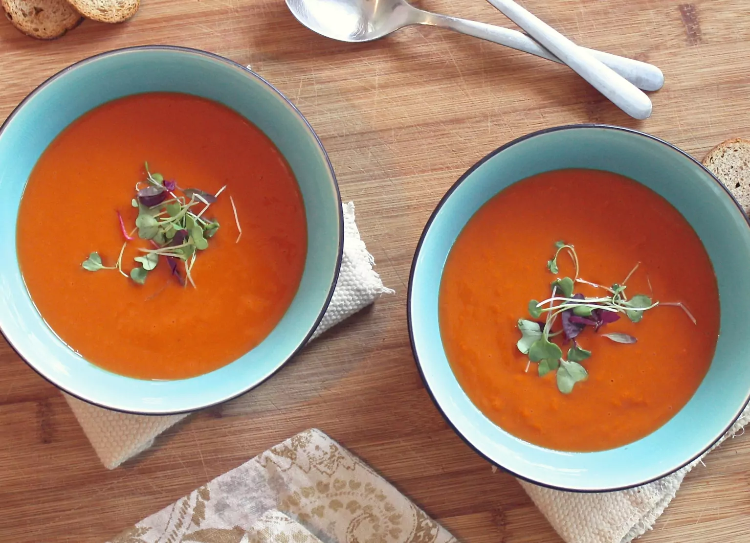 two bowls of tomato soup