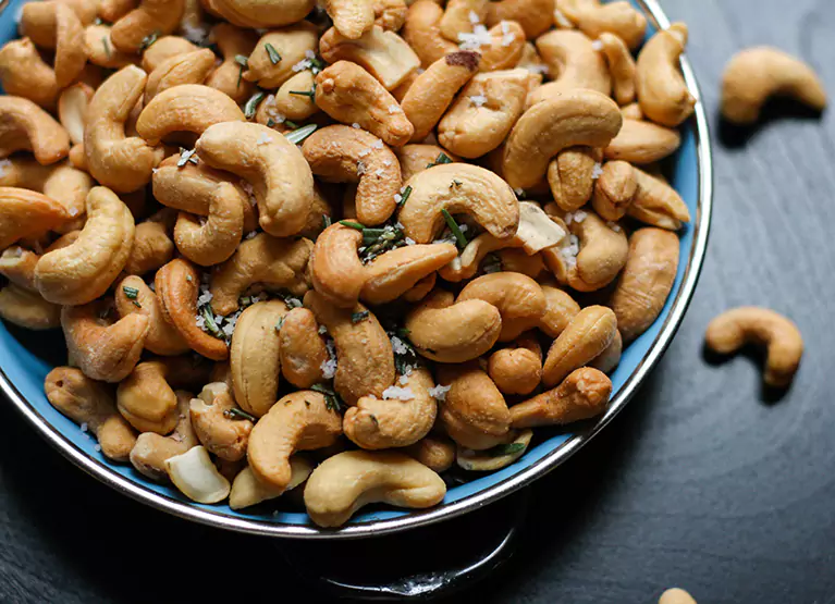 a bowl of toasted cashews