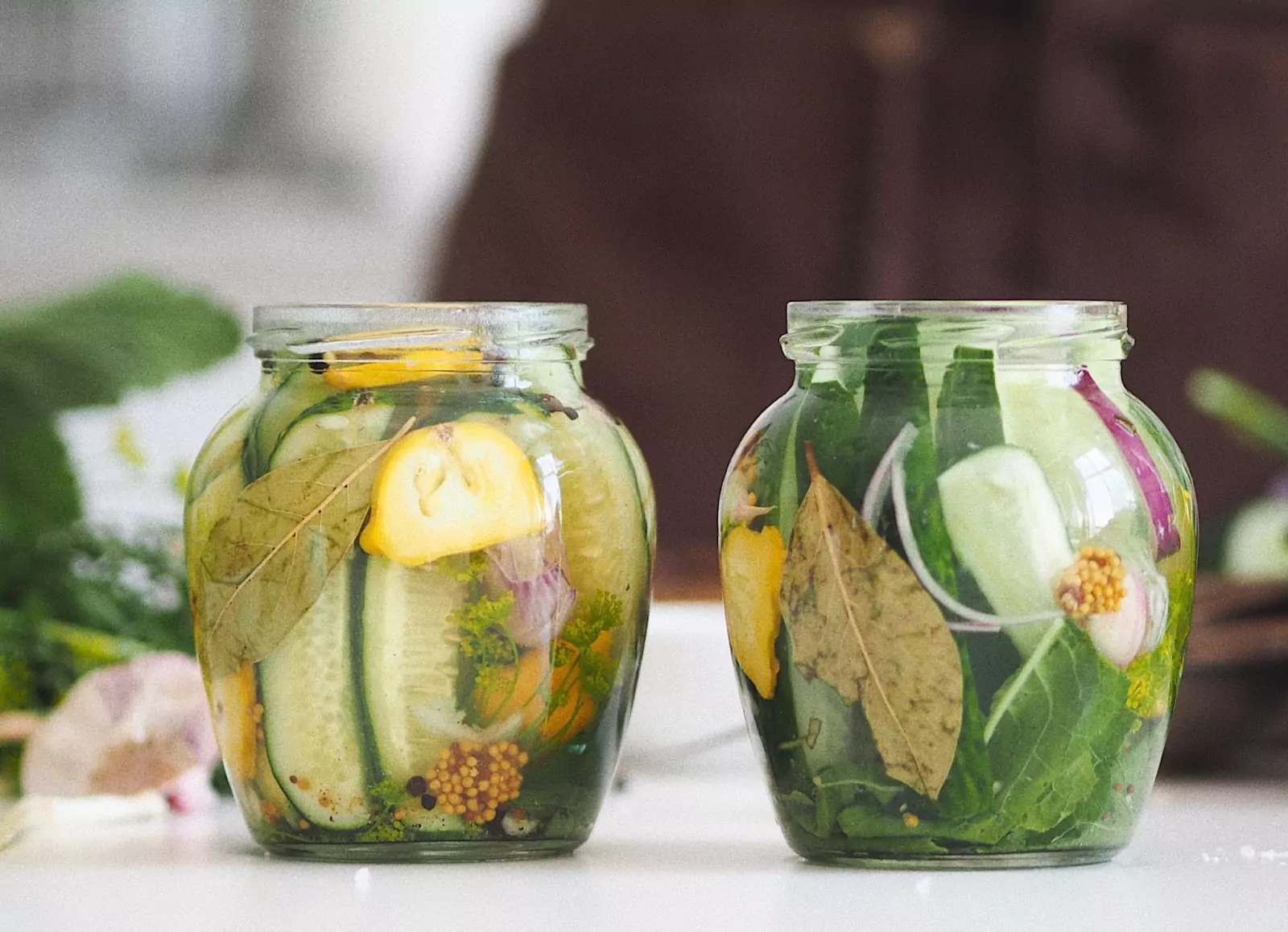 two jars of pickled cucumbers