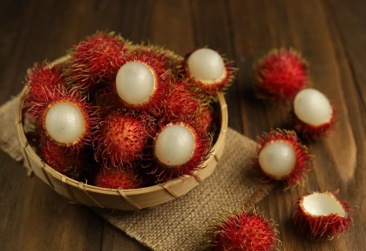 a bowl of Rambutan fruits 