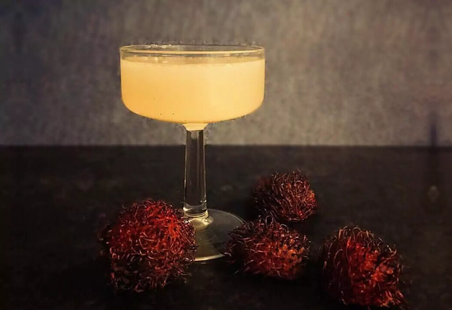 a glass of  Rambutan Martini