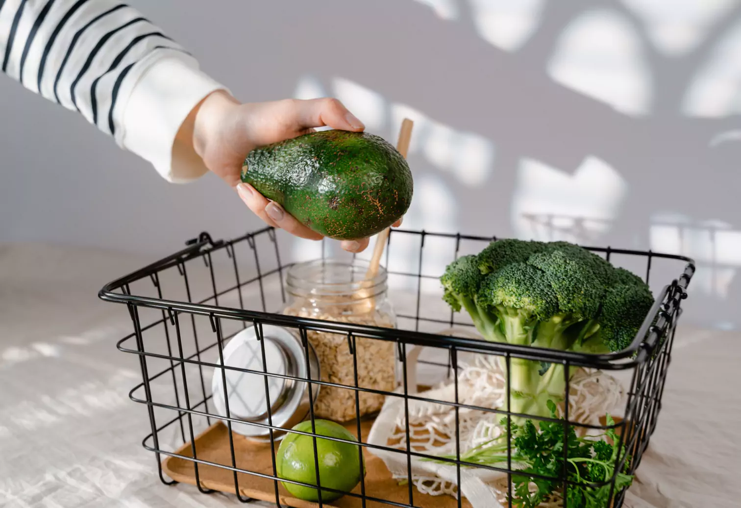 an avocado and broccoli