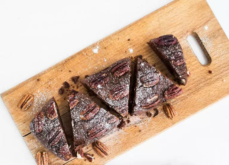 Cutting board with chocolate pecan brownie