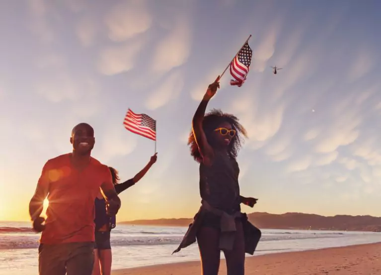 two people with American flags