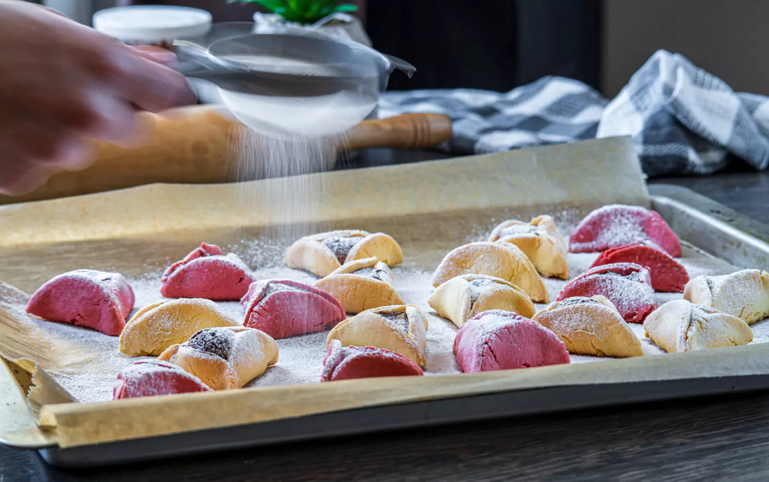 a person preparing Hamantaschen