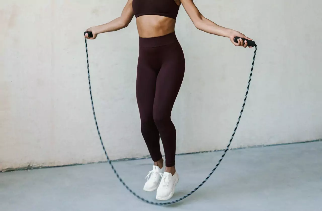 a person exercising with a weighted jump rope 