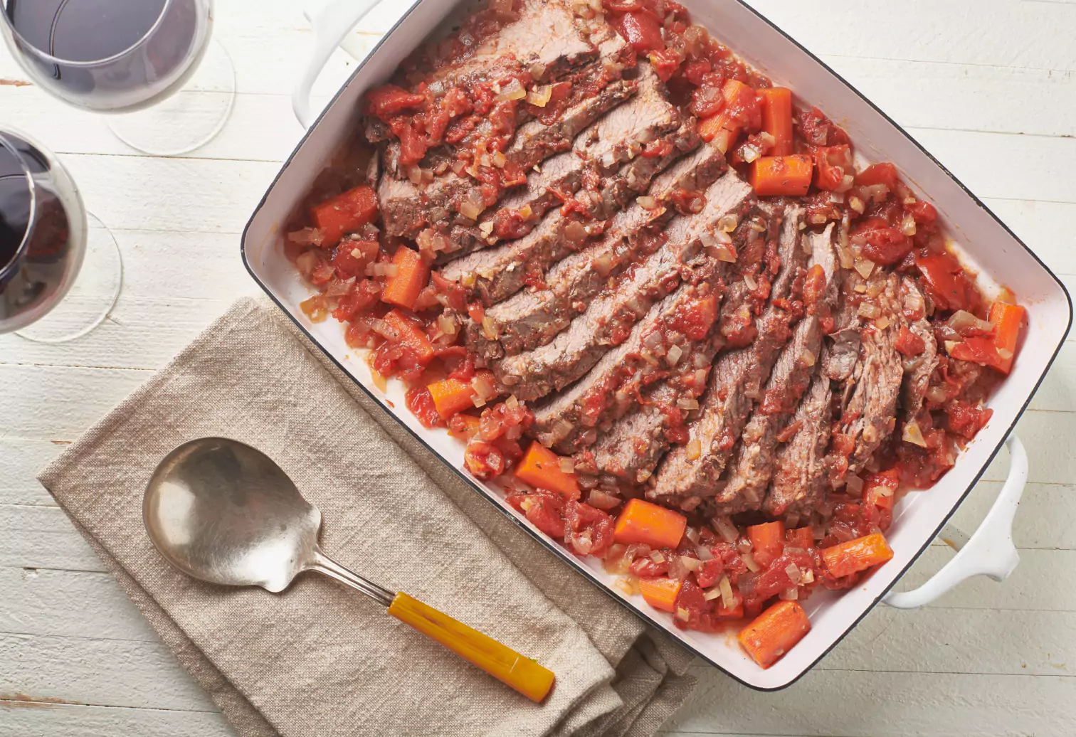 a pan with cooked brisket