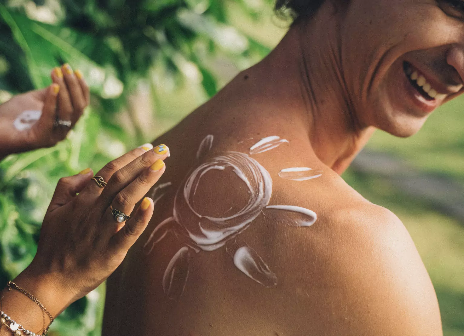 Person applying sunscreen