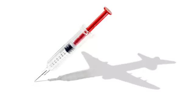 a syringe with a plane-shaped shadow