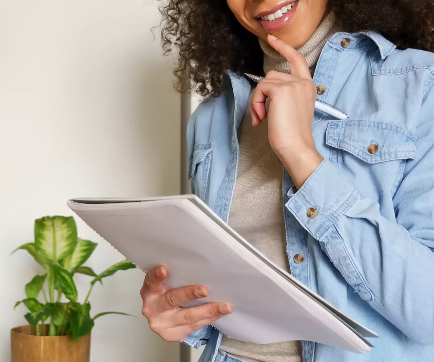 a girl writing in a notepad