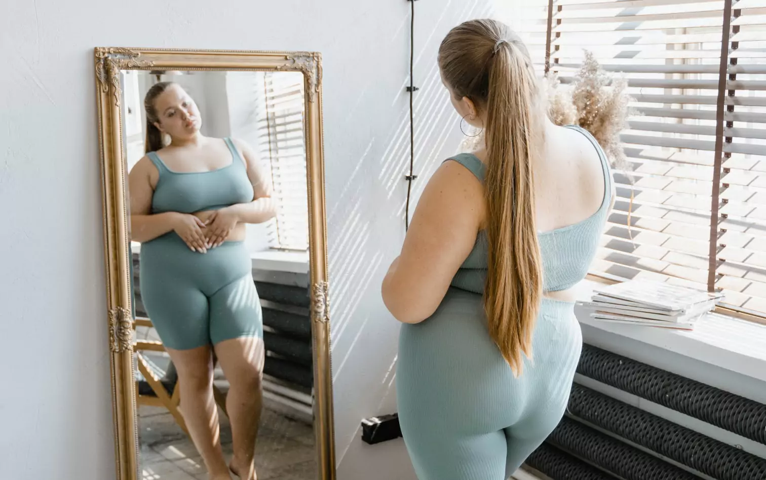 a person looking at themselves in the mirror 