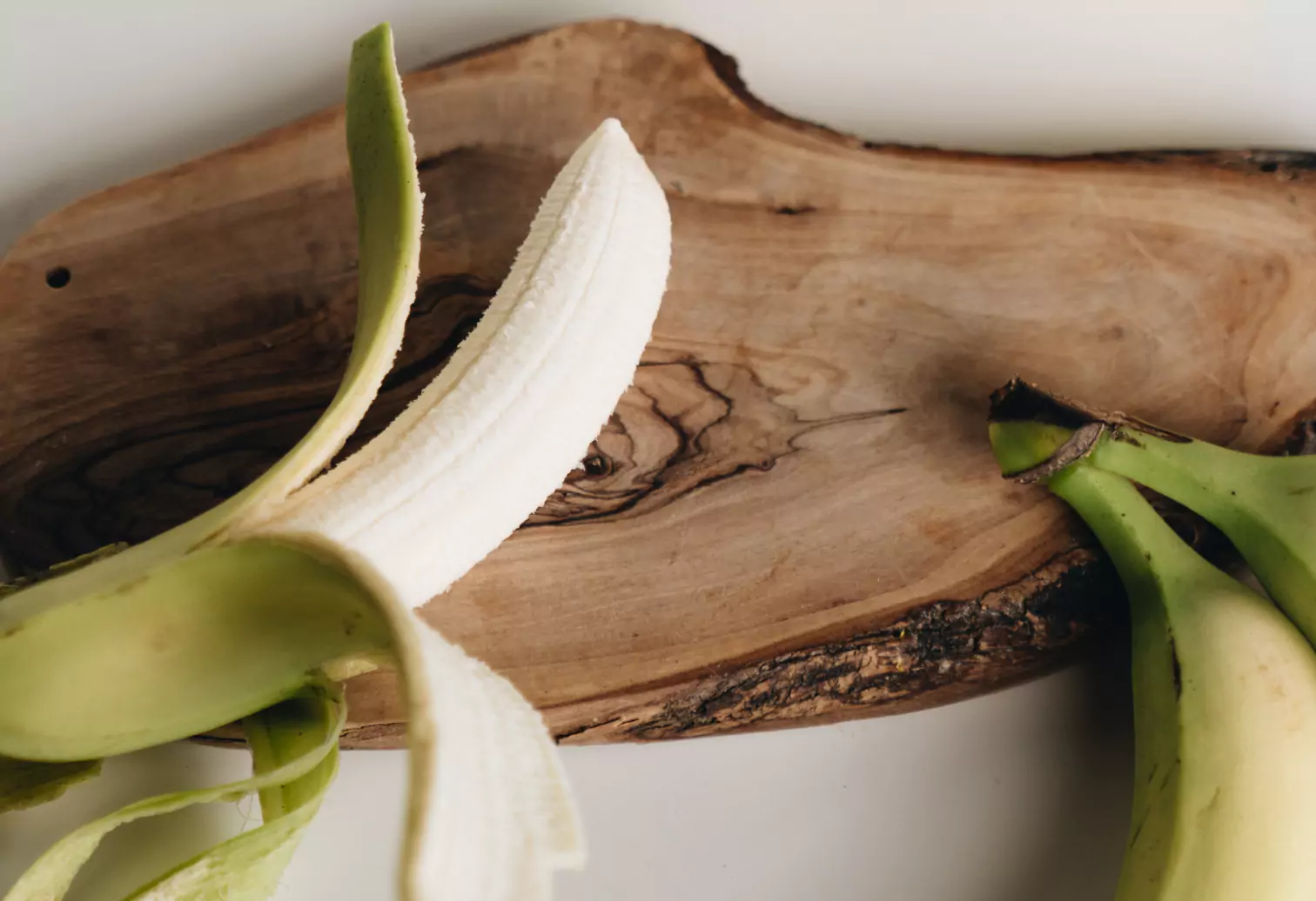 bananas on a wooden board 