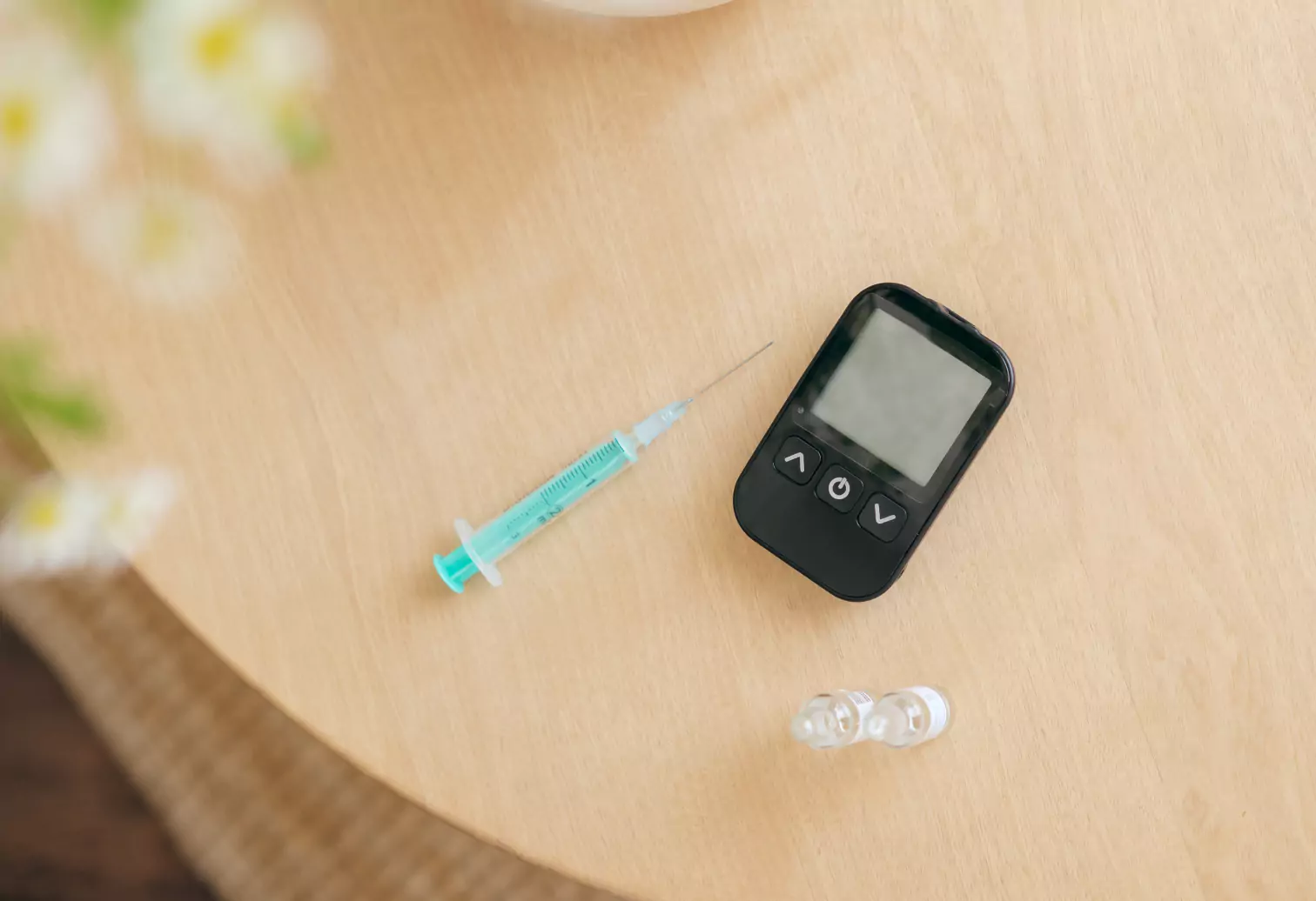 a syringe and a glucose monitor