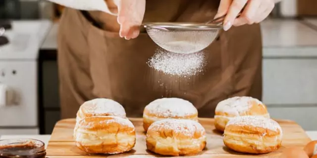 a person making Sufganiyots