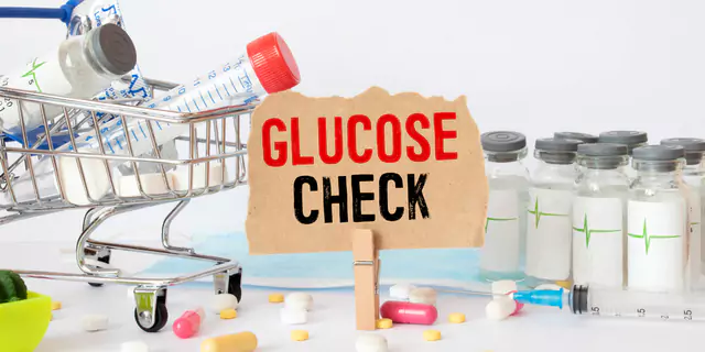 syringes, pills and a sign that says "Glucose check" 