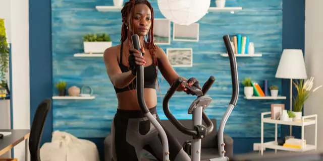 a person doing elliptical workouts 