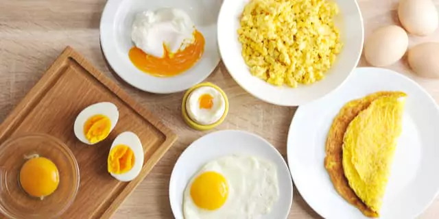 a boiled egg, a fried gg, an omelette, scrambled eggs and a poached egg