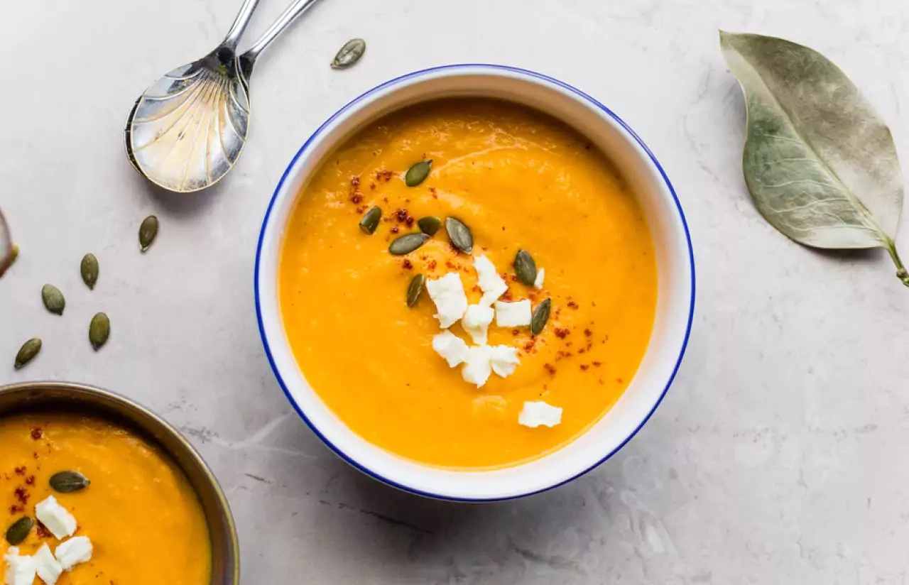 two bowls of cream  winter squash soup 