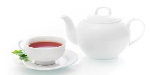 a teapot and a cup of rooibos tea 