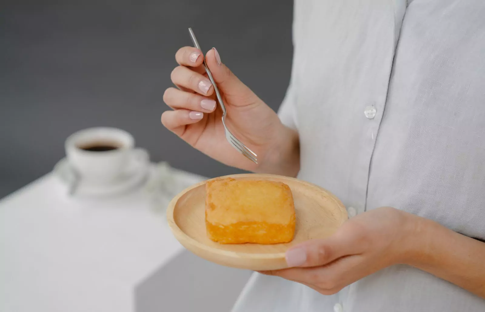 a person eating a cake 