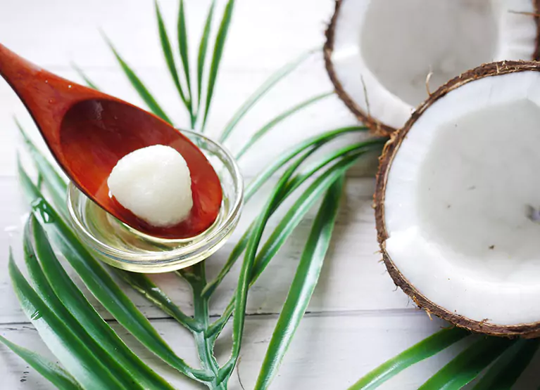 Coconut oil being scooped out