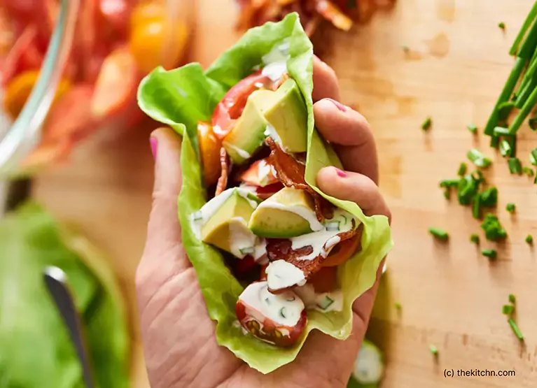 Lettuce wrap with bacon, avocado, peppers