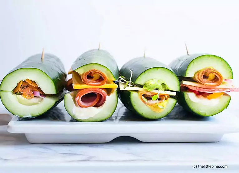 Cucumber boats with rolled up deli meats