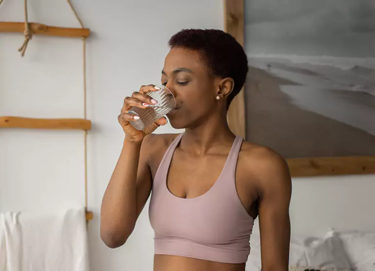 a woman taking an oral glucose test